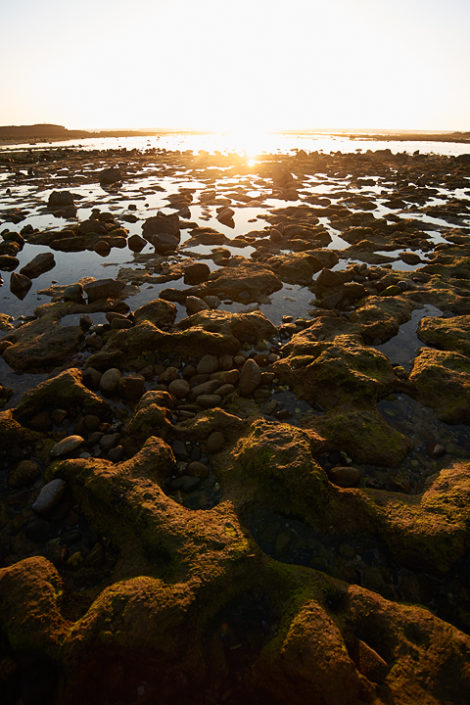 Sonnenuntergang am Strand bei Ebbe